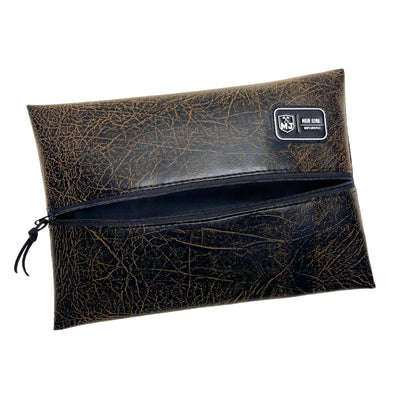 Toiletry bag made for men that lays flat, is leak resistant and is made in the USA.